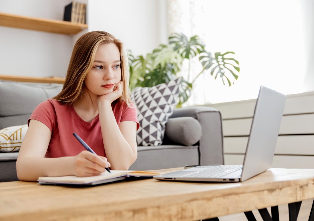 girl studies online at home